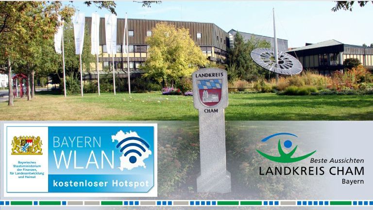 Logo Bayern WLAN und Logo Landkreis mit Außenbild Landratsamt
