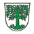 Wappengeschichte: 
Das erste Siegel aus der Zeit um 1300 (Abdruck 1320) enthält als Wappenbild einen Zweig. Erst das von 1352 bis zum späten 16. Jh. verwendete Hauptsiegel führte einen bewurzelten Baum. In den Siegelumschriften findet sich der unterscheidende Zusatz „vor dem Böhmerwald“. 1555 wird der Baum als Buche bezeichnet, seit 1648 erscheint er als Eiche, auch ohne Wurzeln, auf Rasenboden. In der zweiten Hälfte des 19. Jhs. wird der Boden auch als Zwei- oder Dreiberg umgestaltet. Die beiden verschiedenen Wappendarstellungen auf Bürgermeistermedaillen von Prägestempeln der Jahre 1820 und ca. 1915 zeigen einen dichtbelaubten Baum, vermutlich eine Eiche, die auf einem Rasenboden steht. Das 1960 neu festgelegte Wappen orientiert sich dagegen am zweiten Stadtsiegel: blattreiche Buche, mit stark verzweigten Wurzeln. Waldmünchen war bis 1972 Kreisstadt. 

Wappenbeschreibung: 
„In Silber eine bewurzelte grüne Buche.“ Wappenführung seit 1320.