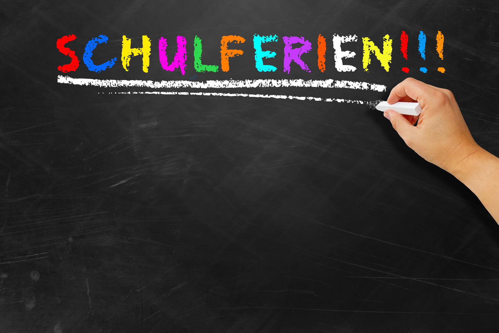 Kreideschrift auf Tafel: Schulferien!